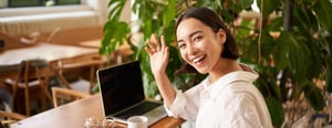portrait-beautiful-young-woman-wave-you-say-hello-greeting-friend-while-sitting-cafe-with